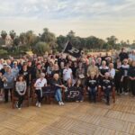 Purdue Alumni posing for group photo.