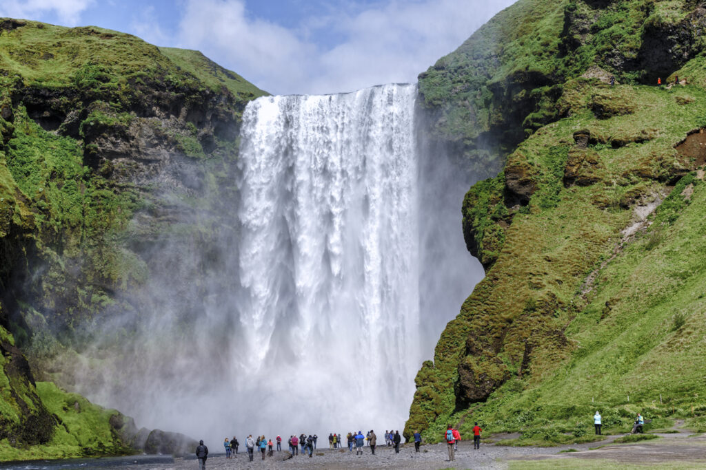 The Skogafoss is one of the biggest waterfalls in the country with a width of 25 metres (82 feet) and a drop of 60 m (200 ft). Due to the amount of spray the waterfall consistently produces, a single or double rainbow is normally visible on sunny days.