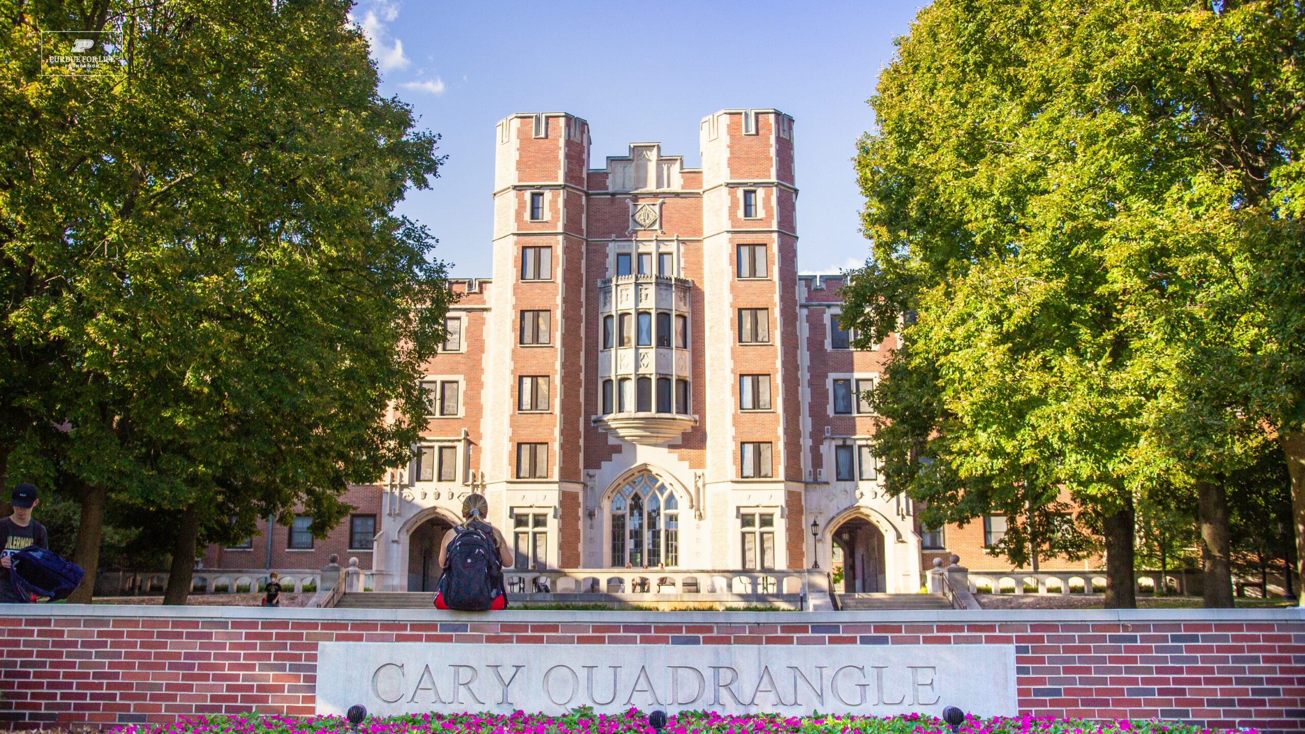 An image of building at Purdue University for August calendar with students