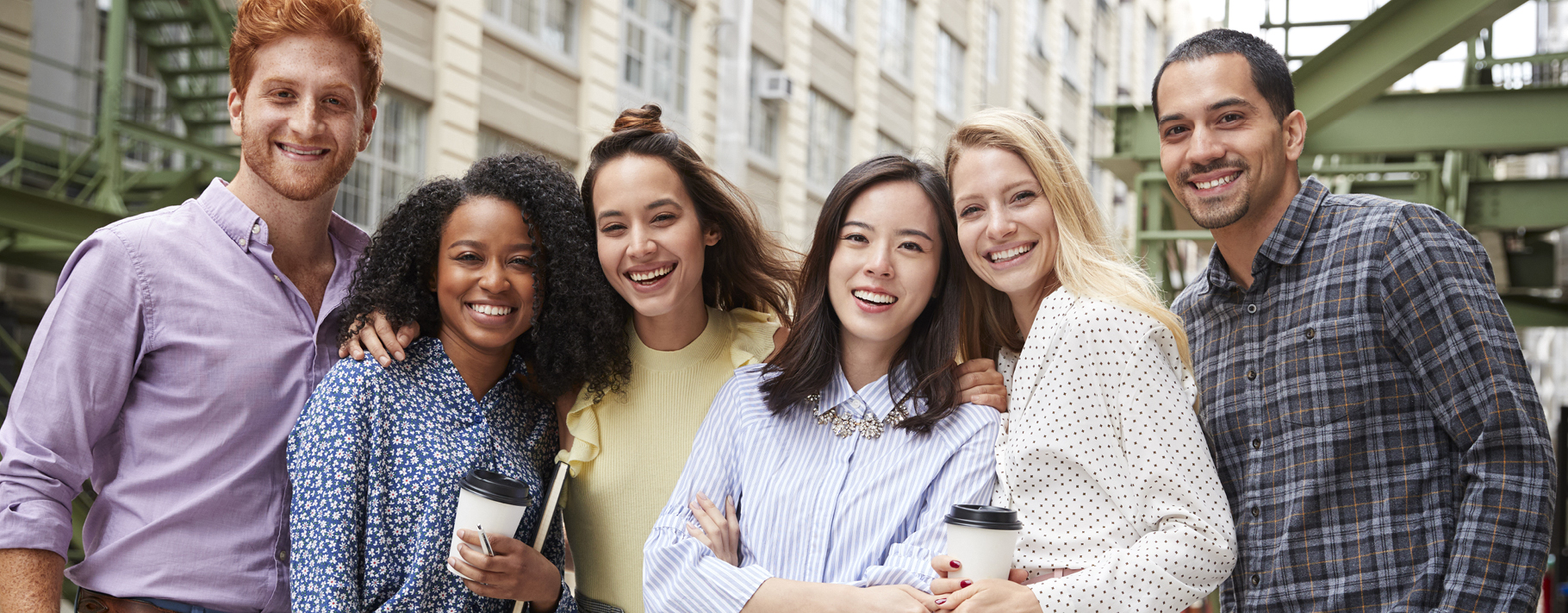 Diverse group of people posed for photo