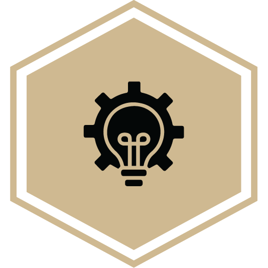 Hexagon icon showing for the Bechtel Innovation Design Center field trip, featuring a light bulb within a gear.