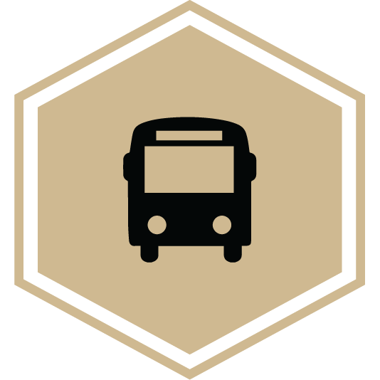 Hexagon icon showing for the Campus Bus Tour field trip, featuring a bus.