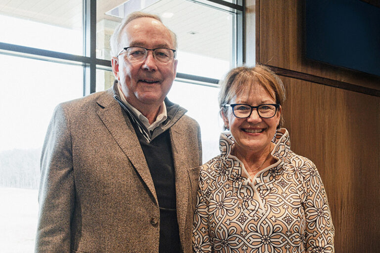 Man and a Woman posing next to each other
