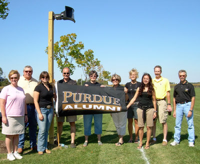 A group of Purdue Alumni posing for a photo