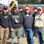 4 Purdue Alumni posing for a photo