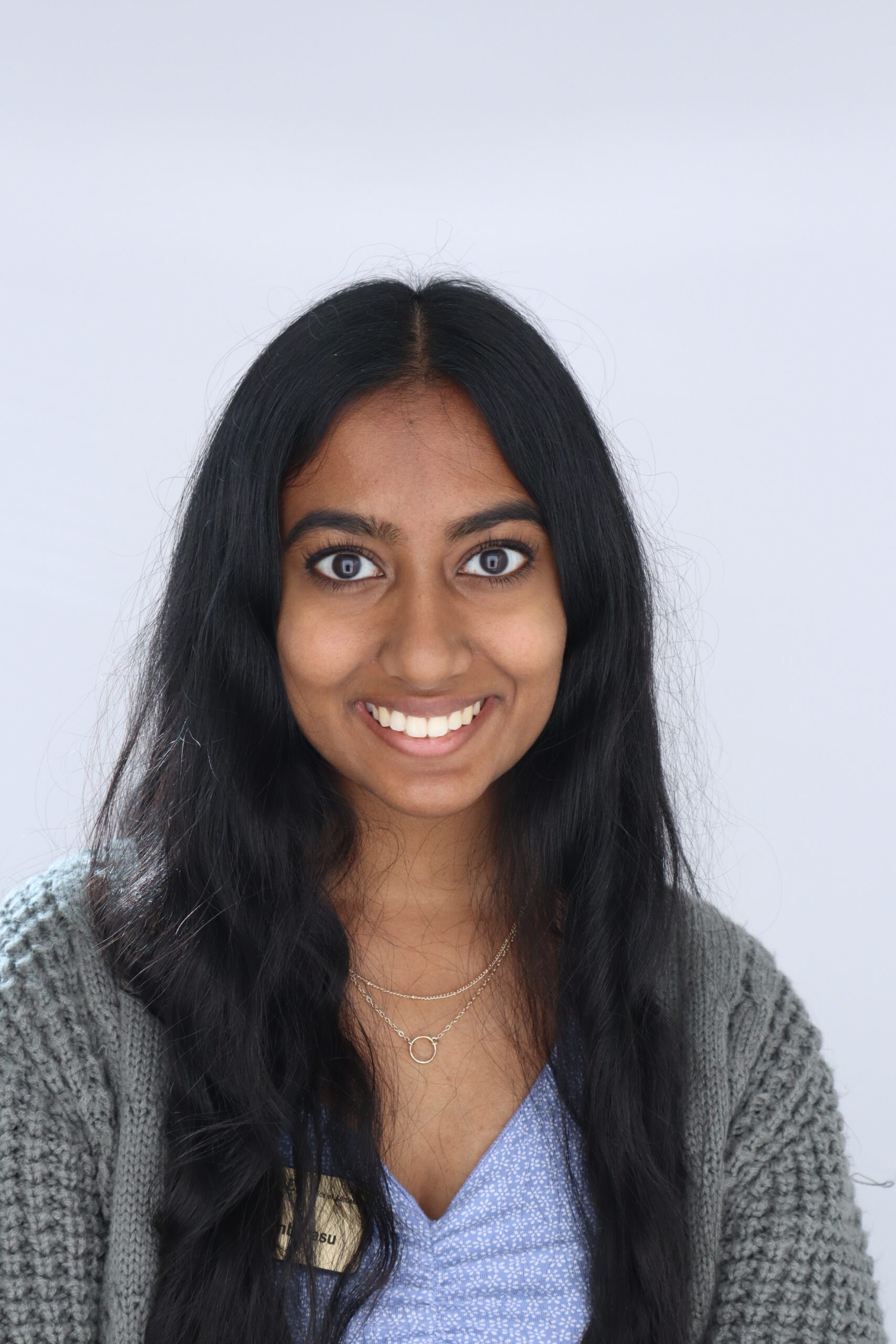 A woman smiling