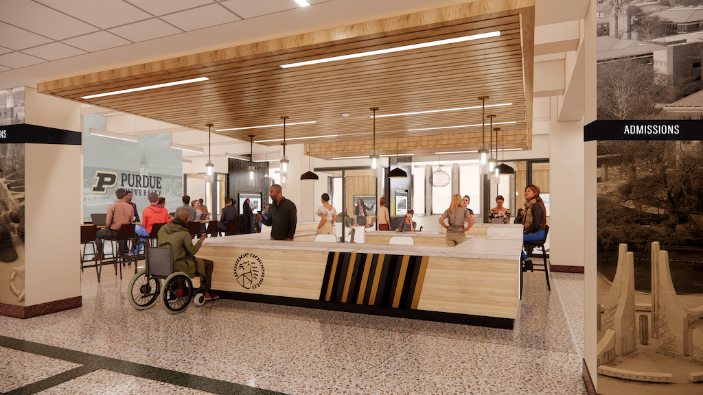 View of open air reception desk which is U-shaped. Man on wheelchair is facing a standing receptionist. Floor is marble type. There are people inside and outside around the desk. There's a big sign on left that says Purdue University with a picture of the campus in the background. This is a rendering.