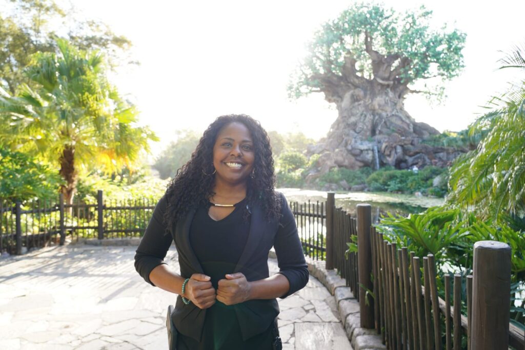 Purdue alumnus Angel Price in front of "Pandora - The World of Avatar" attraction at Walt Disney World