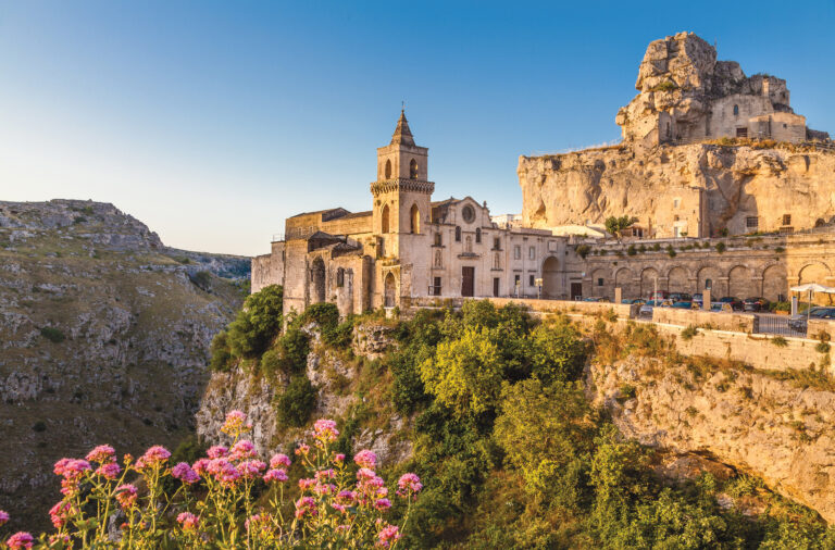 Ancient town of Matera (Sassi di Matera), European Capital of Culture 2019, in beautiful golden morning light at sunrise, Basilicata, southern Italy