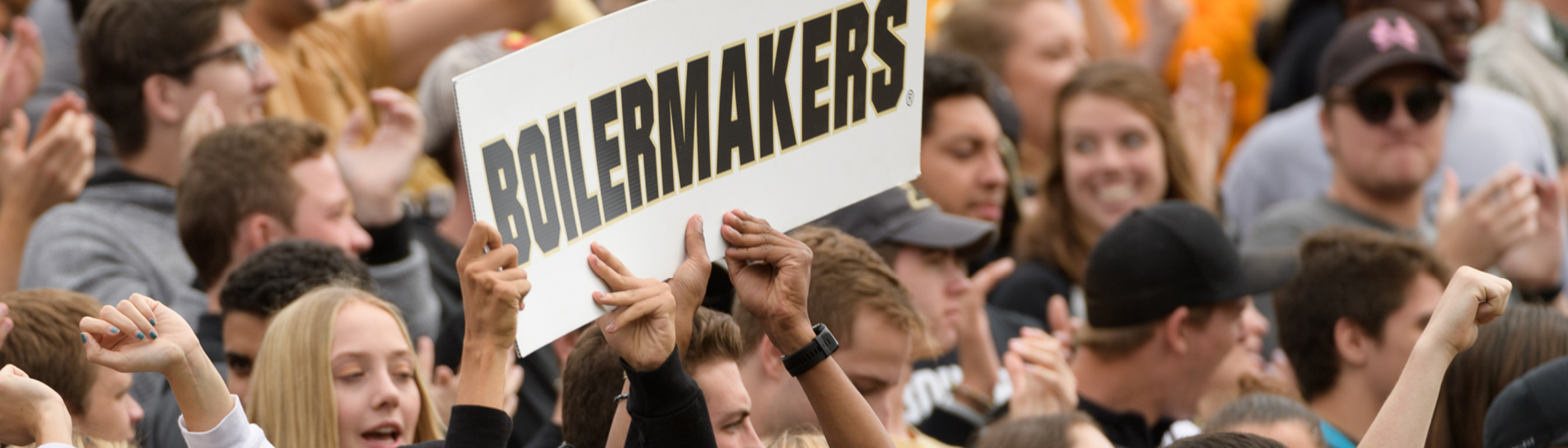Students Holding a boilermakers sign