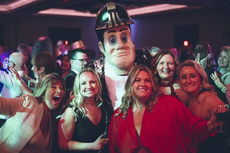 A group of women with Purdue Pete