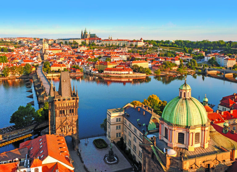 Aerial view of Charles bridge during sunrise in Prague Czech Republic