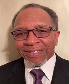 An image of Roland Brown