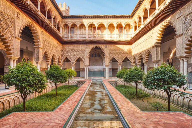 Courtyard in the Royal Alcazar of Seville (Real Alcazar de Sevilla), Seville, Spain