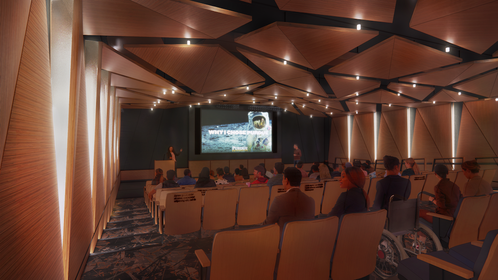 A rendering of a theater. The ceiling has wood that is shaped like a triangle and it's all over. There's a large screen at the end with two people standing next to it. There are seats and people sitting watching the movie and lecture.