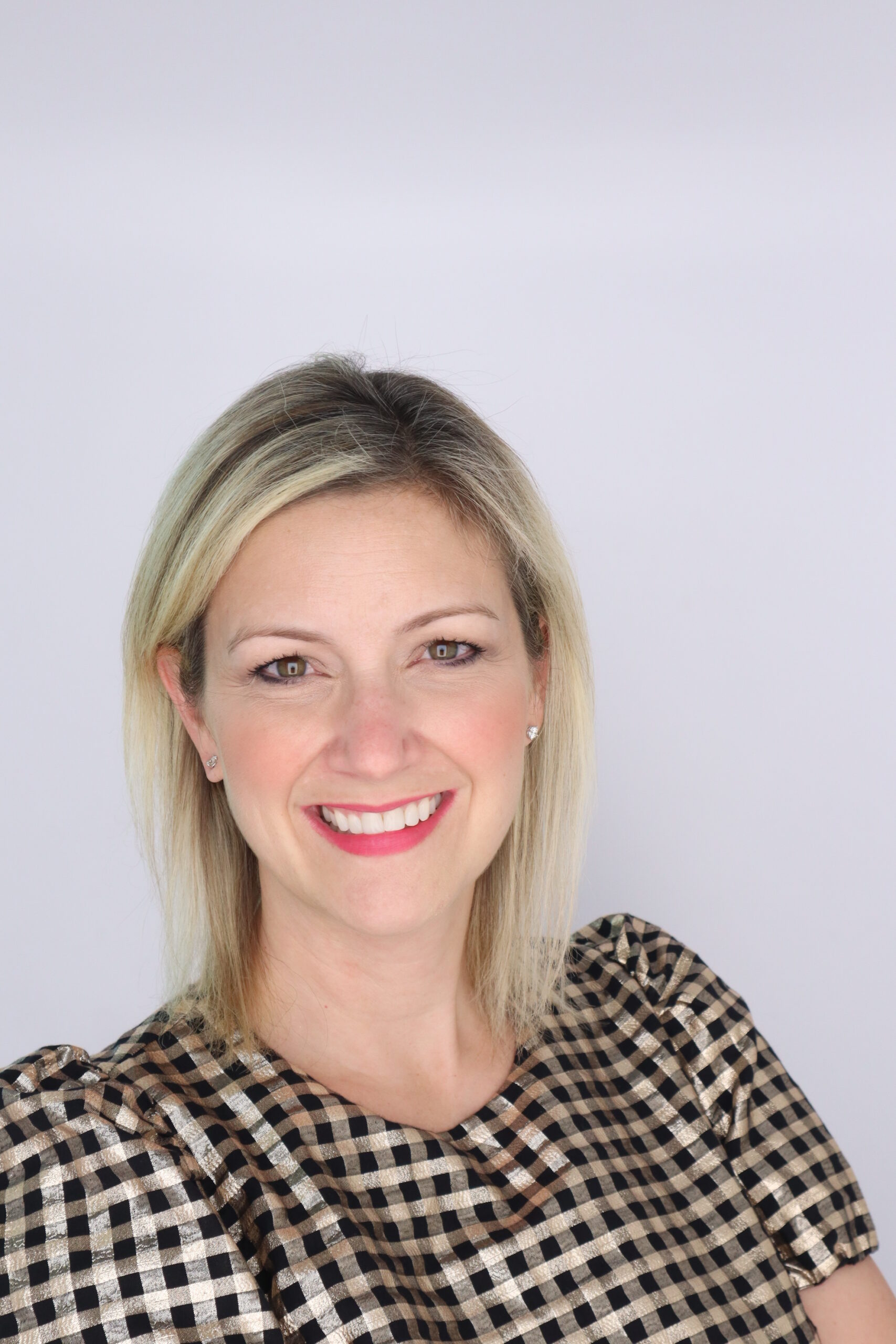A woman smiling