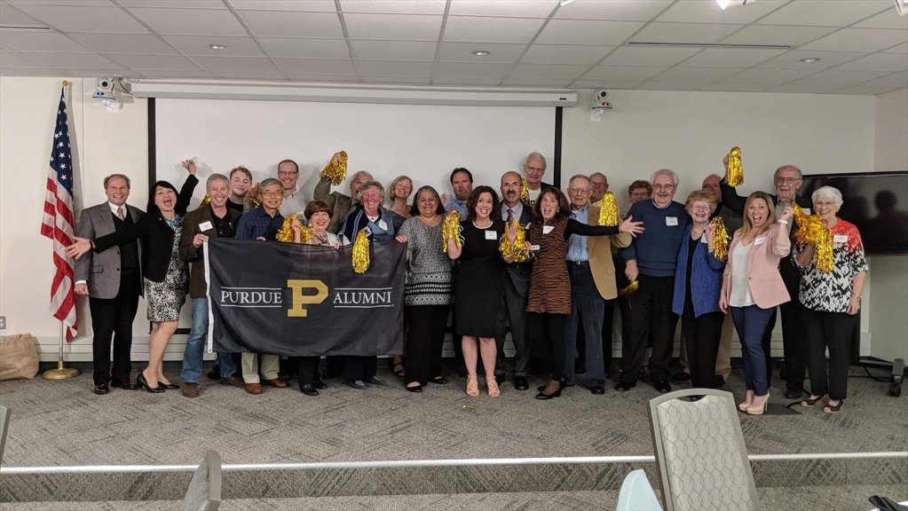 A group of Purdue Alumni posing for a photo
