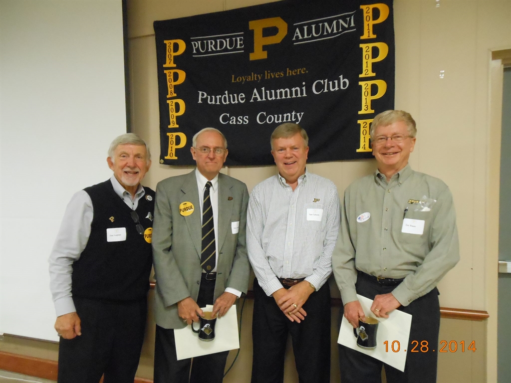 4 Purdue alumni posing for a picture