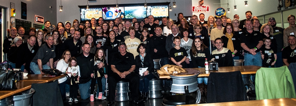 A group of Purdue Alumni posing for a photo