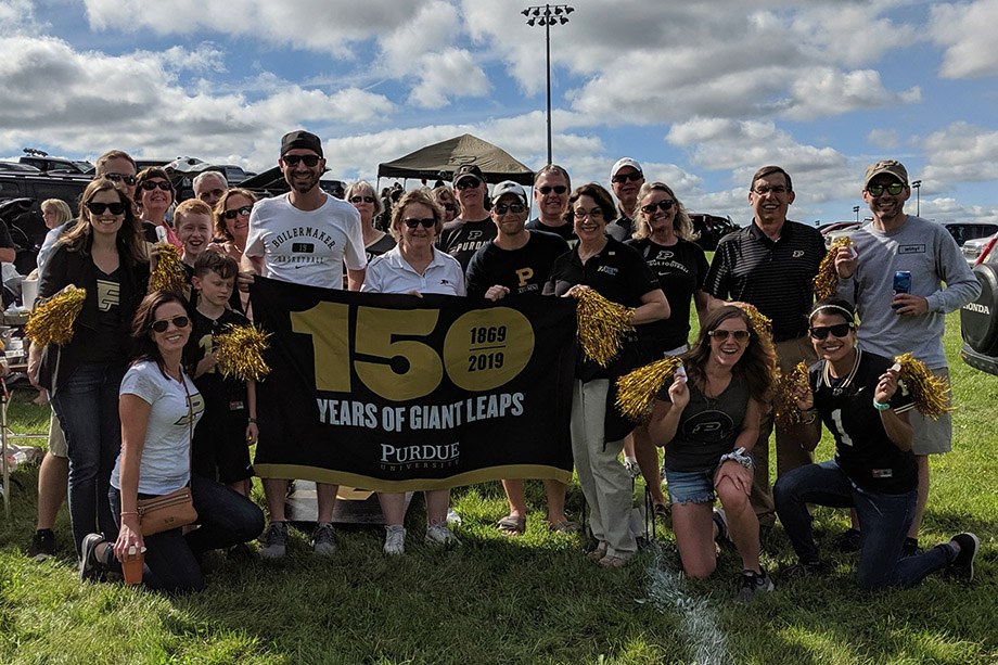 A group of Purdue Alumni posing for a photo