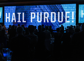 Screen showcasing Hail Purdue during the homecoming game!