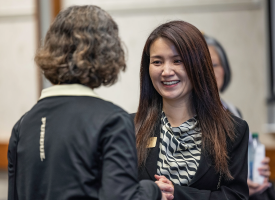 Purdue First Lady YingKei Hui talks to participant at Purdue for Life Foundation's "Back to Class" event.