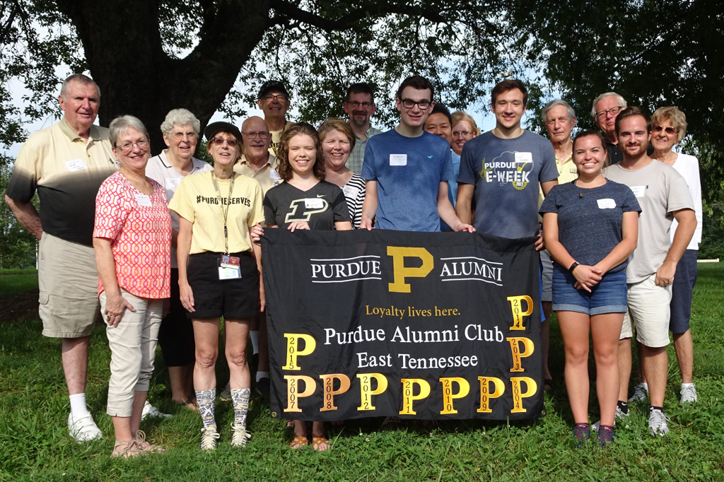 A group of Purdue Alumni posing for a photo