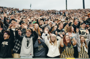 An image of Purdue Football fans cheering
