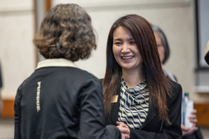 Purdue First Lady YingKei Hui talks to participant at Purdue for Life Foundation's "Back to Class" event.