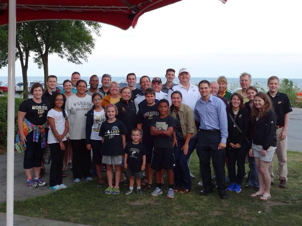 A group of Purdue Alumni posing for a photo