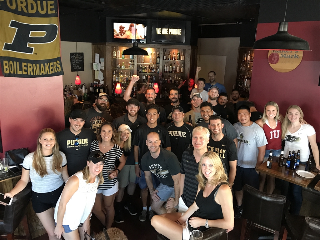 A group of Purdue Alumni posing for a photo