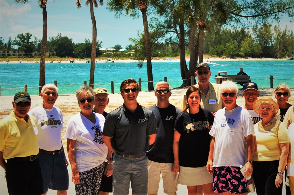 A group of Purdue Alumni posing for a photo