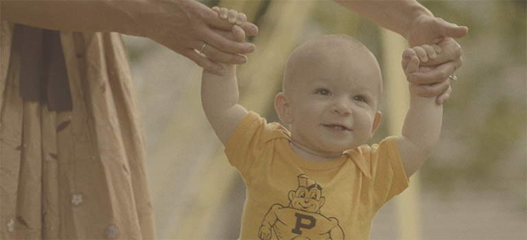 Child wearing a Purdue Pete shirt